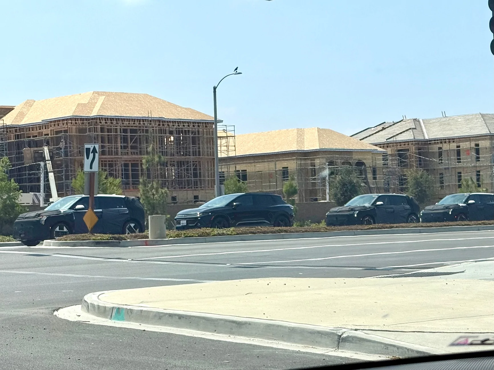 Kia EV3 Spotted: 2027 EV3 testing in US vs. Chevrolet Equinox EV (Irvine, CA  August 2025) IMG_9269