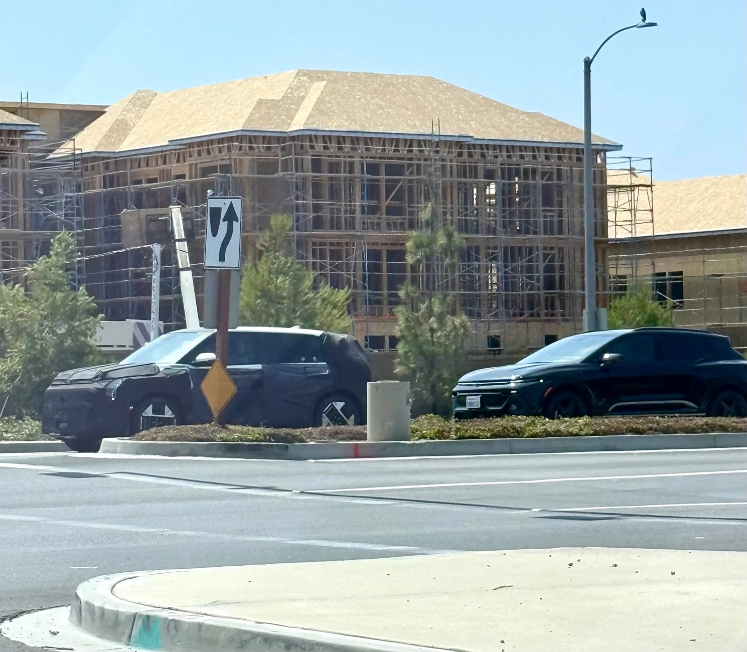 Kia EV3 Spotted: 2027 EV3 testing in US vs. Chevrolet Equinox EV (Irvine, CA  August 2025) IMG_9271